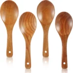 Four brown wooden cooking spoons
