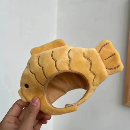 Takoyaki-inspired cotton head cover for a small cat