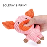 Plush squeaky dog toy available in pig, elephant, rabbit, and cow designs